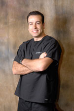 Dr. Khalil in his black scrubs