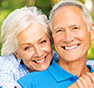 Elderly couple smiling