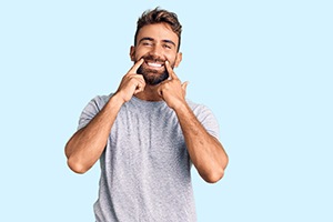 Handsome man showing off his smile with straight teeth