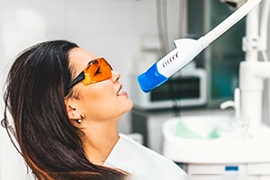 Woman benefiting from in-office teeth whitening