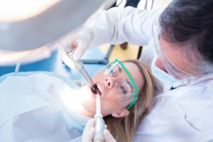 dentist in Oakton treating young woman