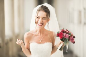 Bride smiles after getting porcelain veneers from her Oakton dentist