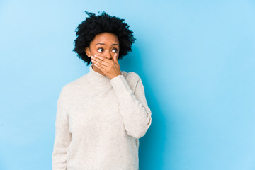 person with knocked-out tooth covering their mouth